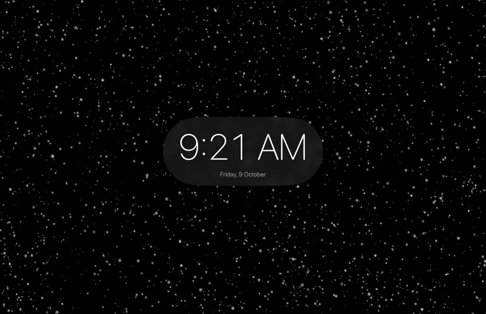 Ambient Mode, snow over a black screen with a clock